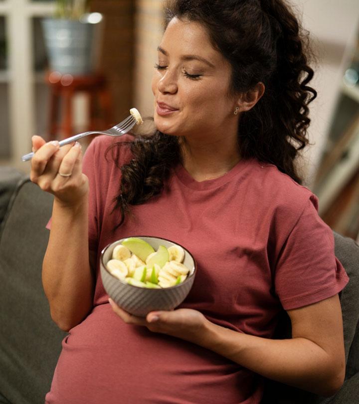 Pregnant women taking some snacks