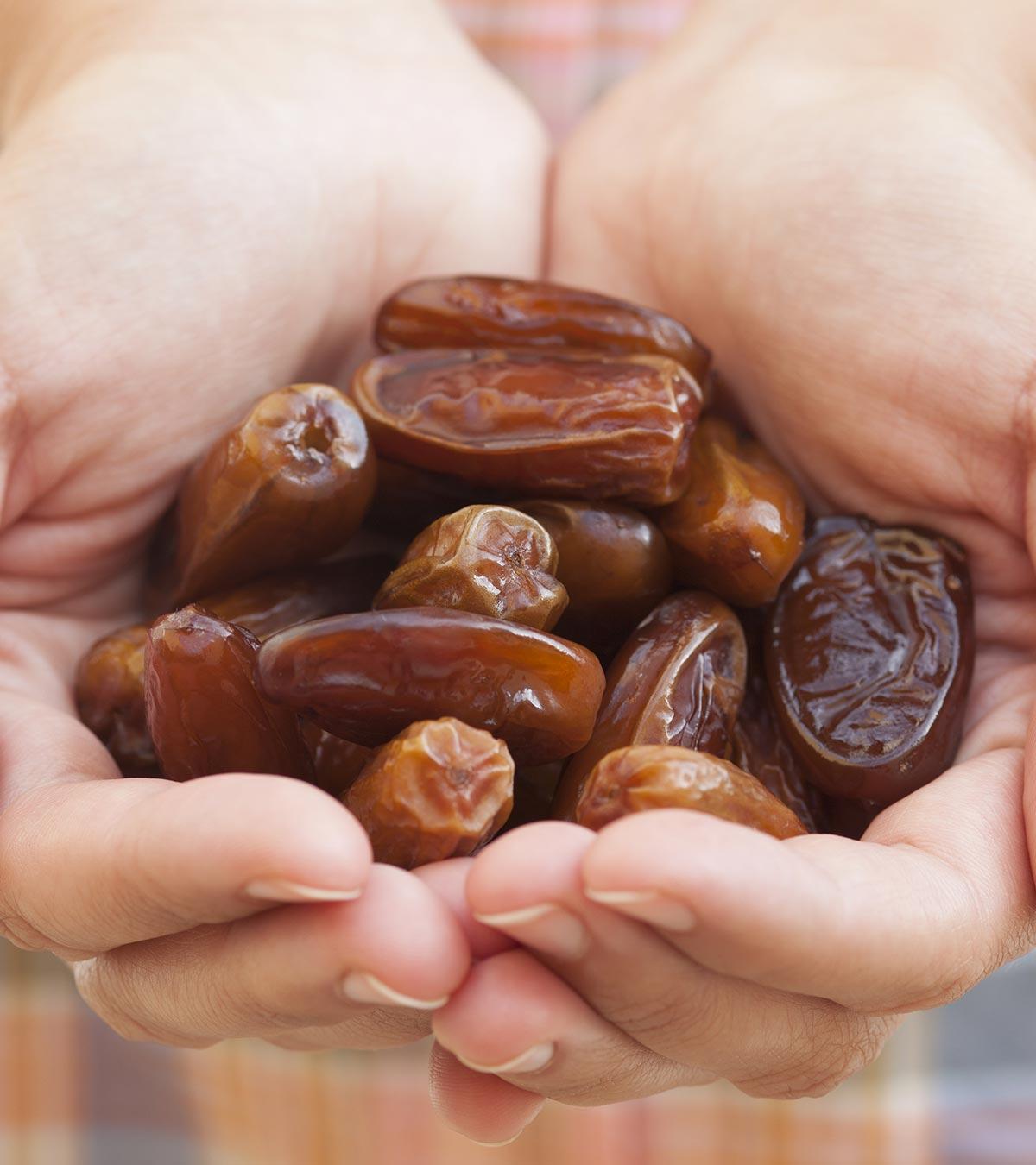 A person holds some dates