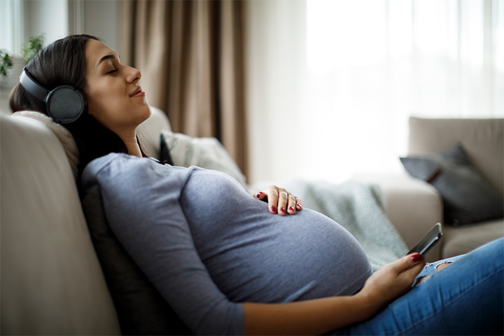 Listen to music to relax and cope with Braxton Hicks contractions