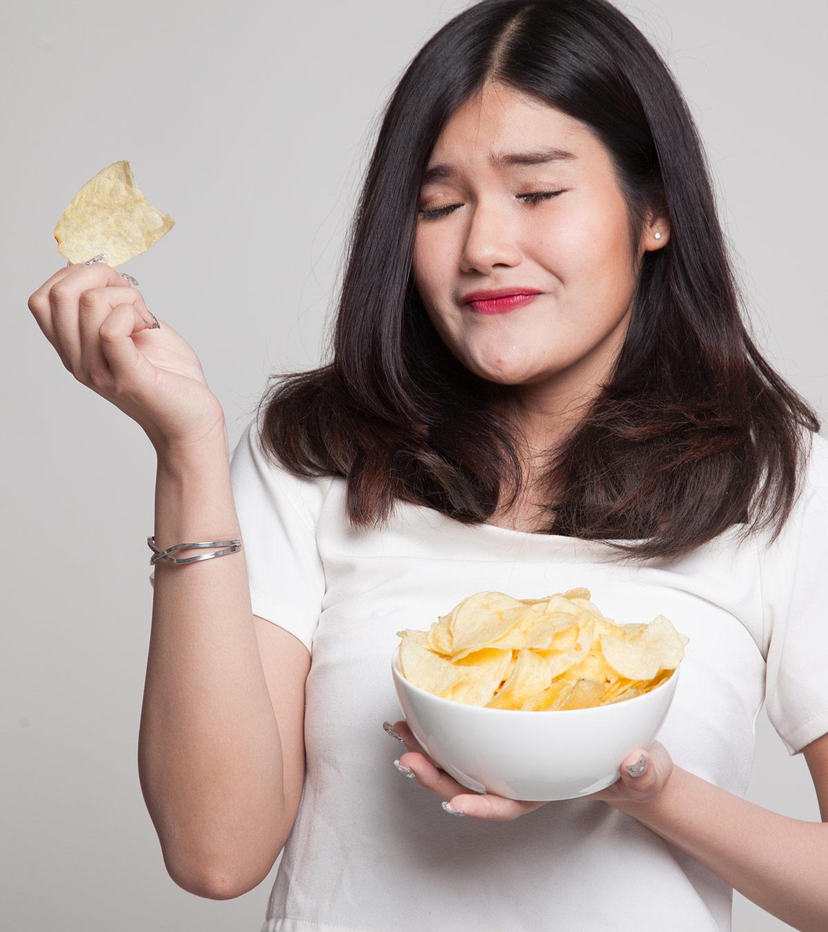 A Pregnant Woman Eating Potato Chips