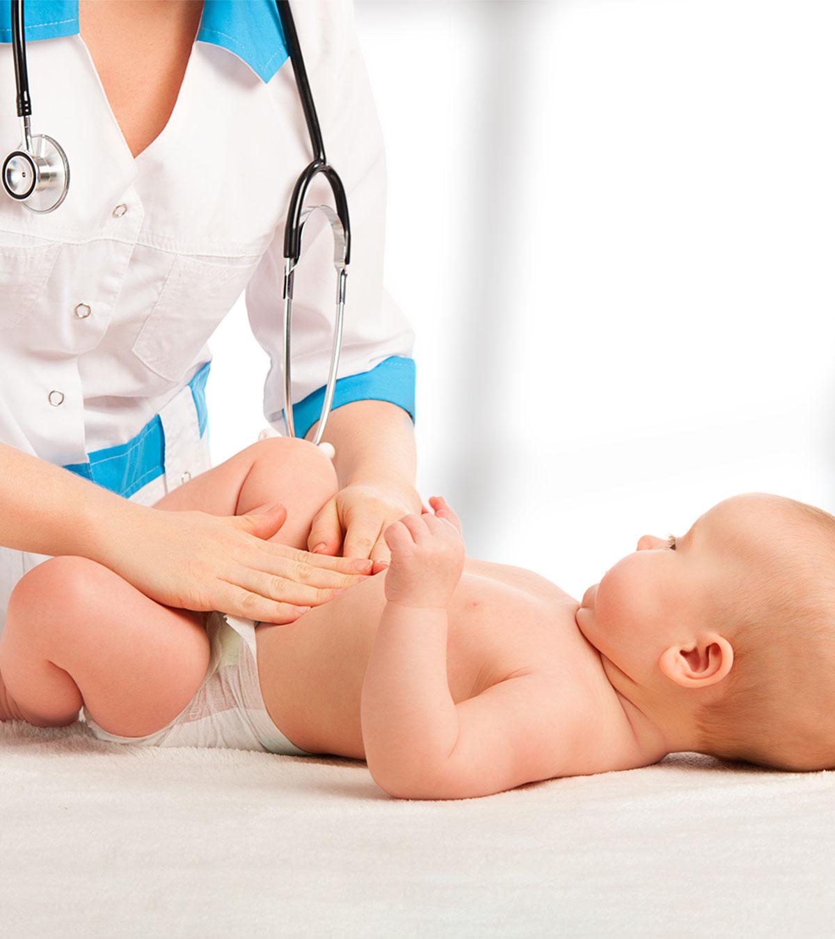A Doctor Checking Pinworms In Baby Stomach