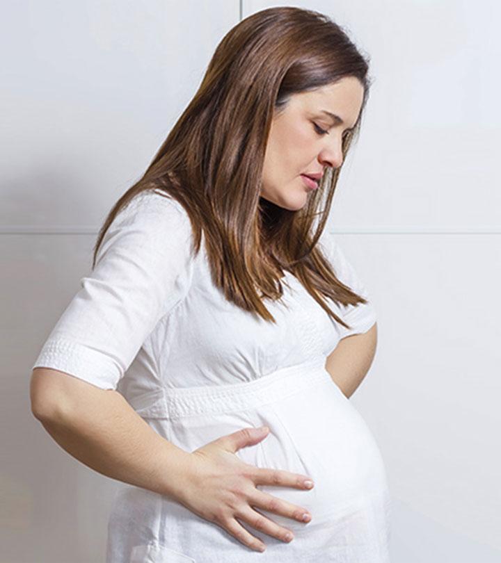 A Pregnant Woman Suffering From Stomach Flu
