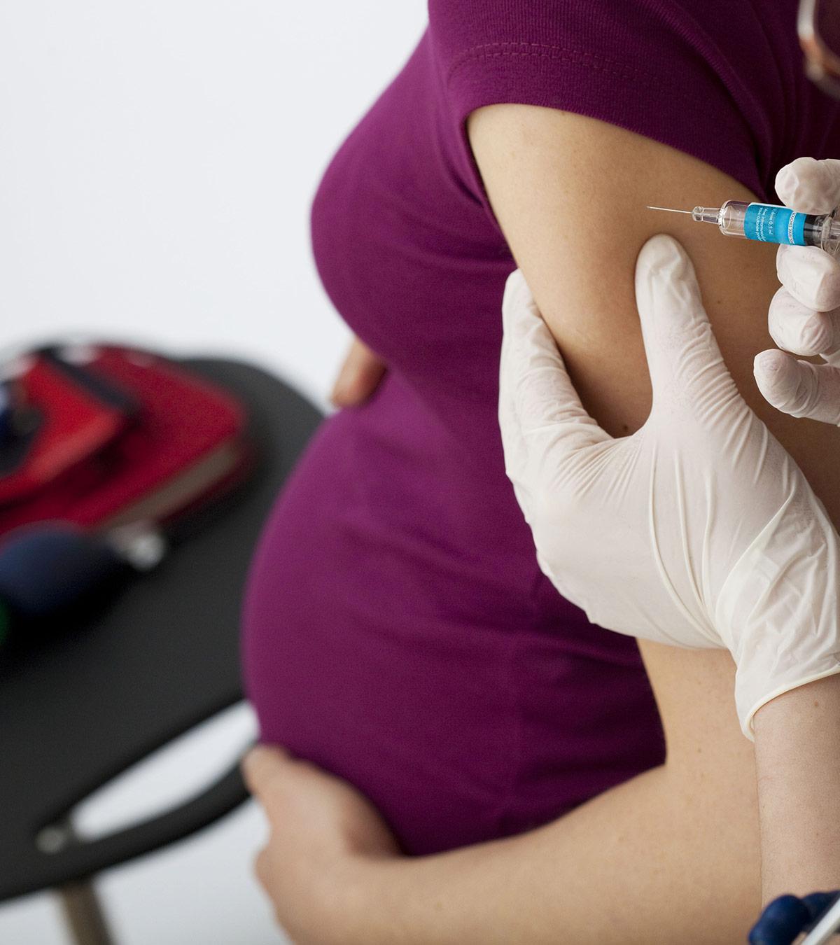 Pregnant Woman Receiving A Tetanus Vaccine
