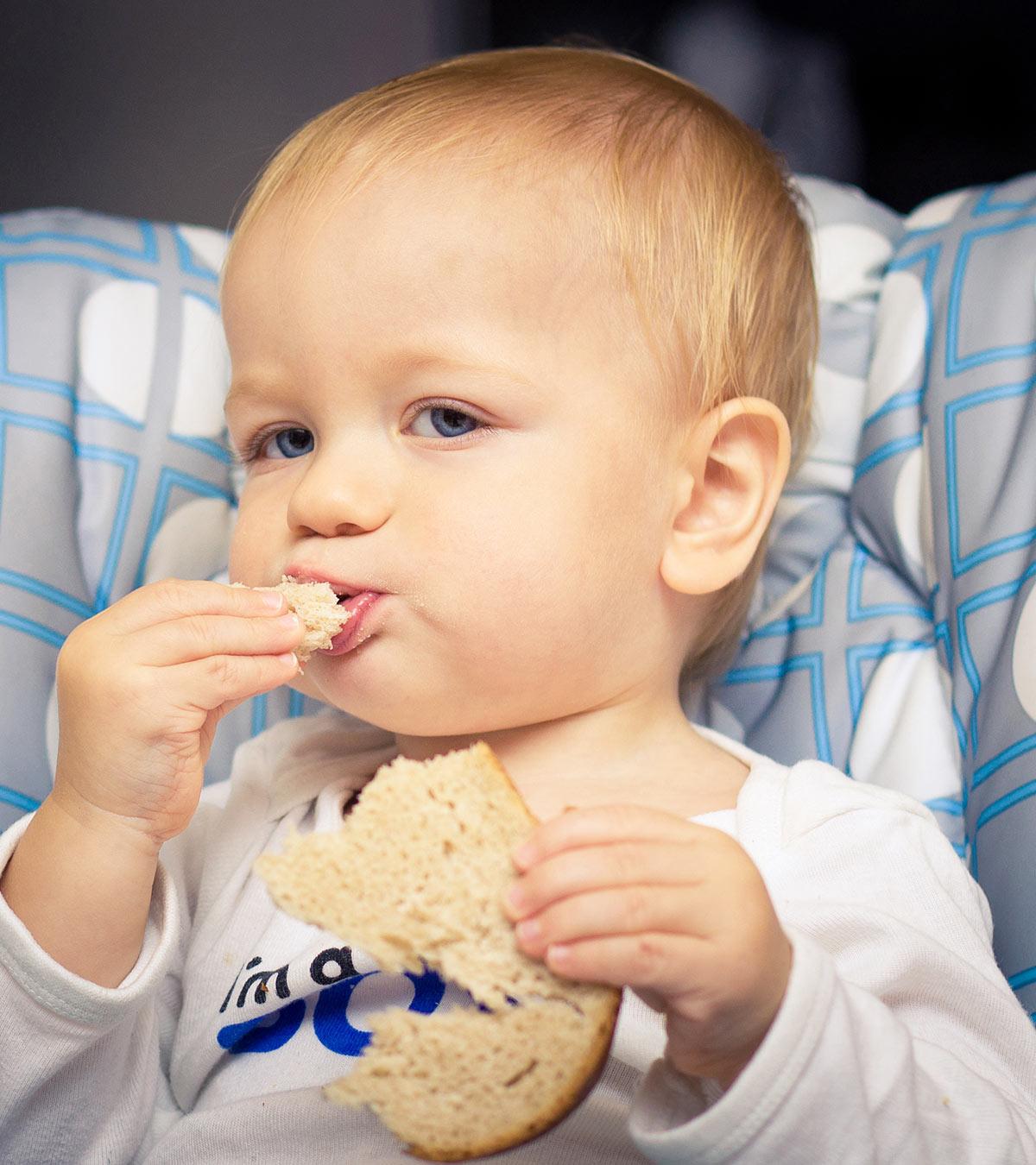 Baby Eating Wheat Bread