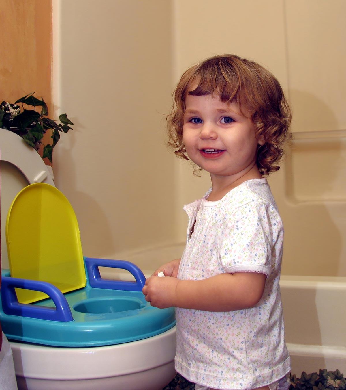 Toddler Sitting On A Potty