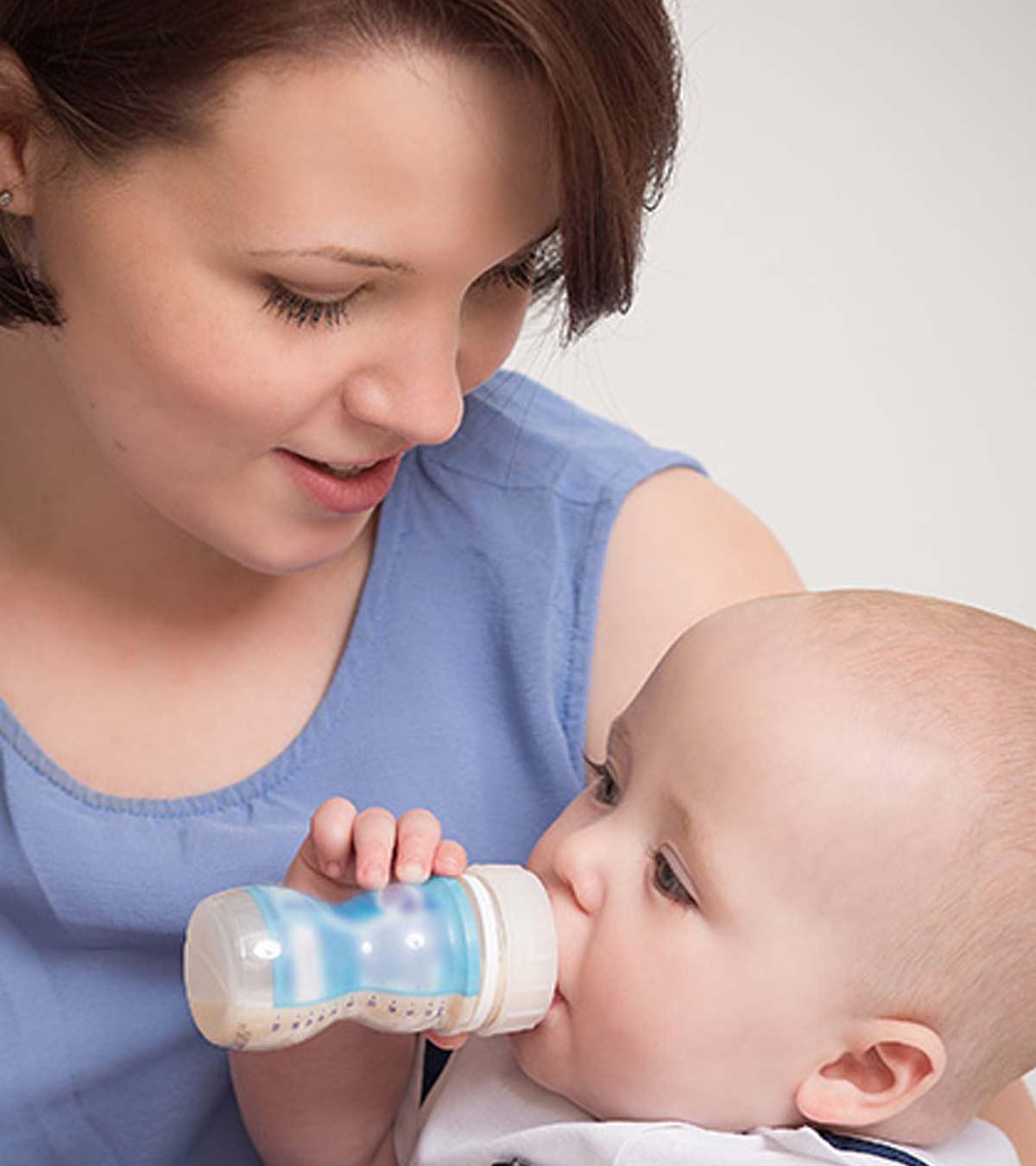 Baby Drinking Soy Milk From A Bottle