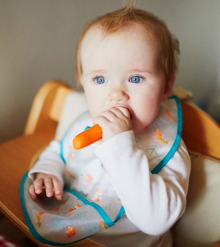 Infant With Carrots, Indicating Allergy Symptoms