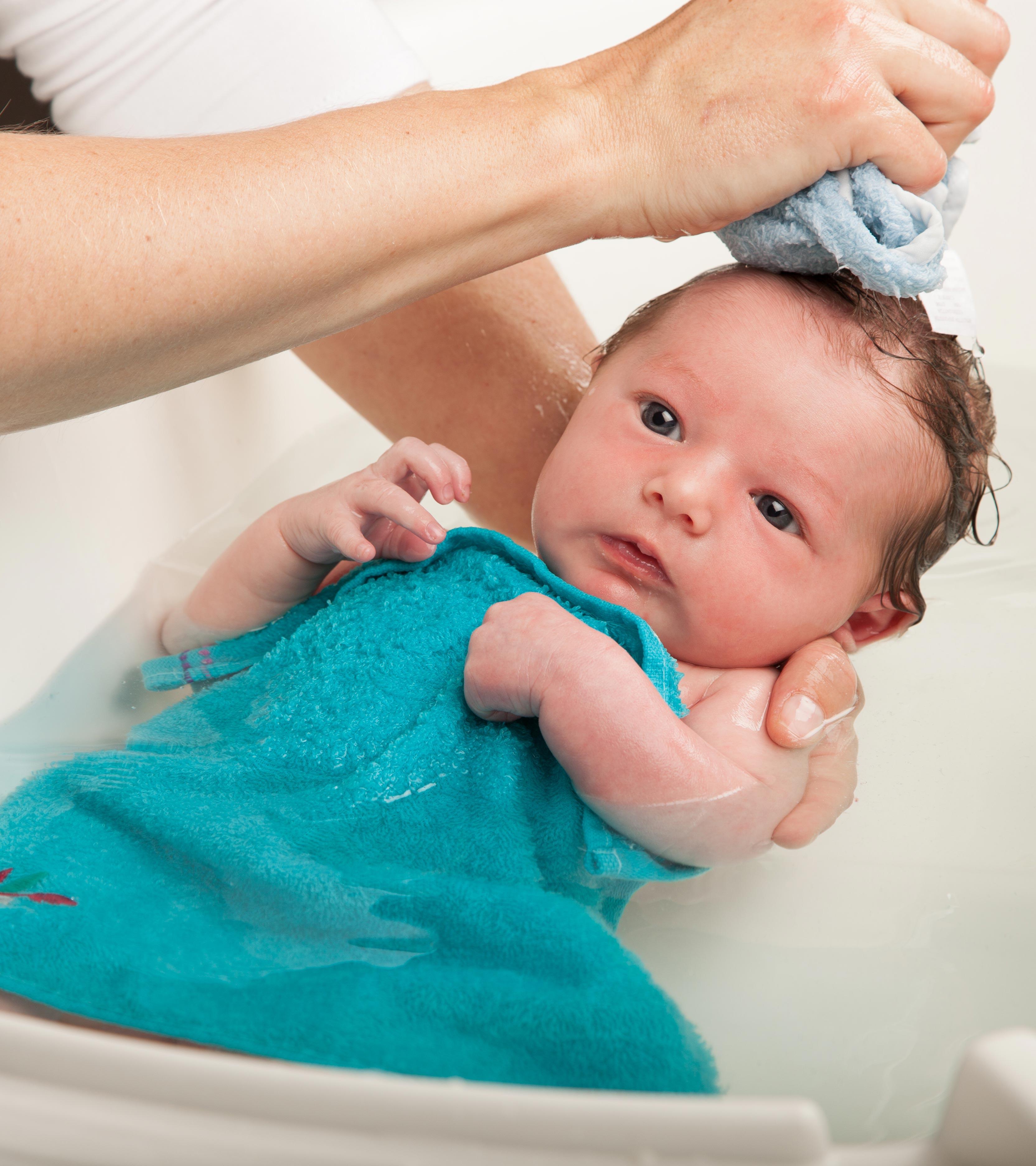 Baby Taking A Bath At Night