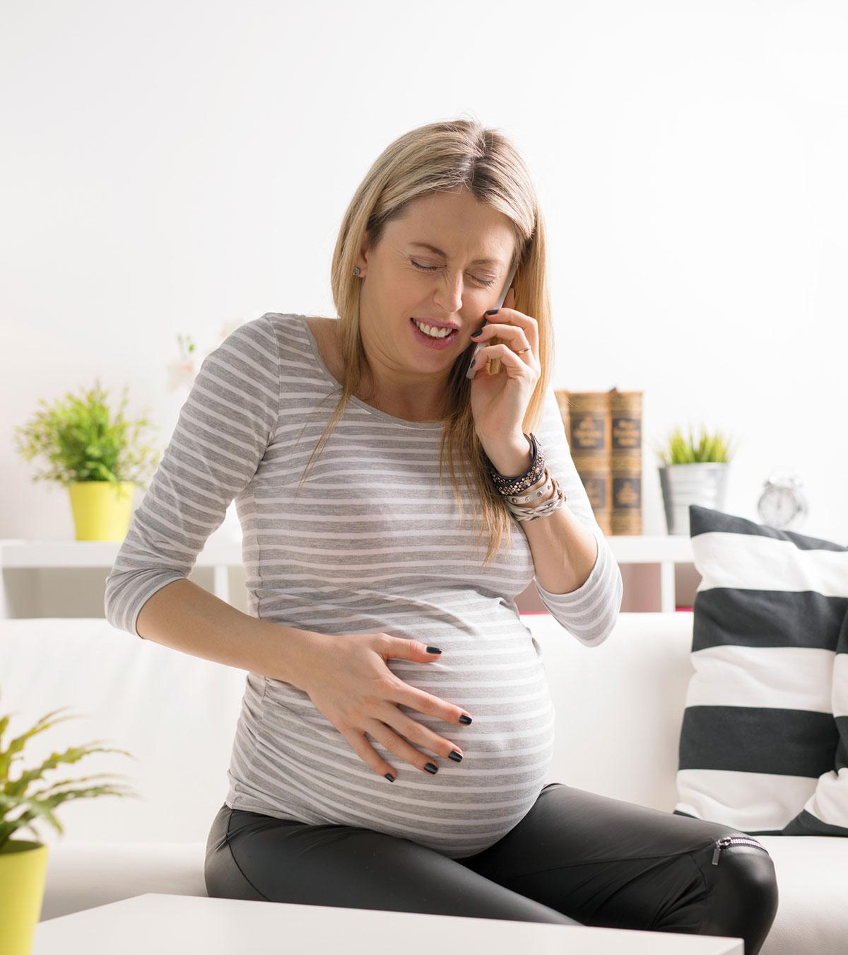 Pregnant Woman Feeling Baby Drop