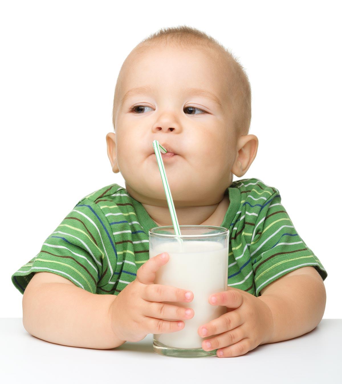A toddler drinking soy milk