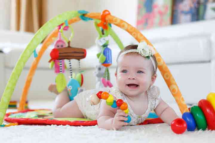 When Do Babies Start Holding & Playing With Toys?