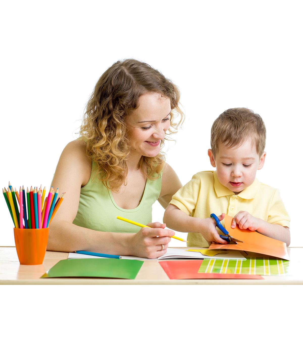 A kid playing a shape-learning game