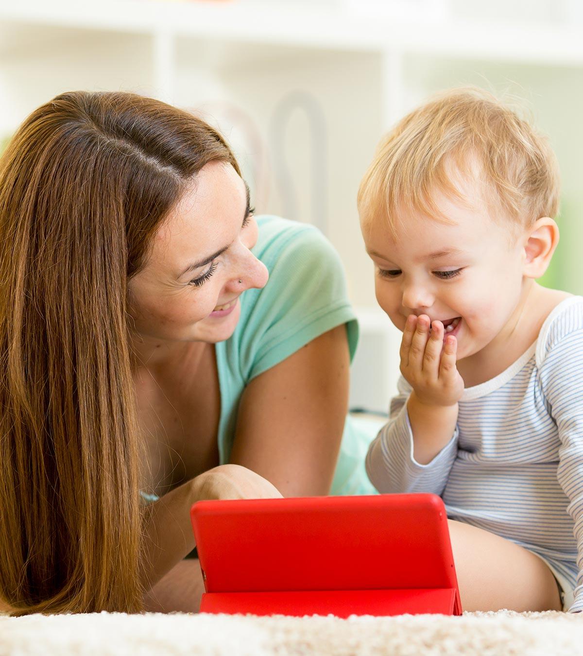 A mom with her baby using an iPad