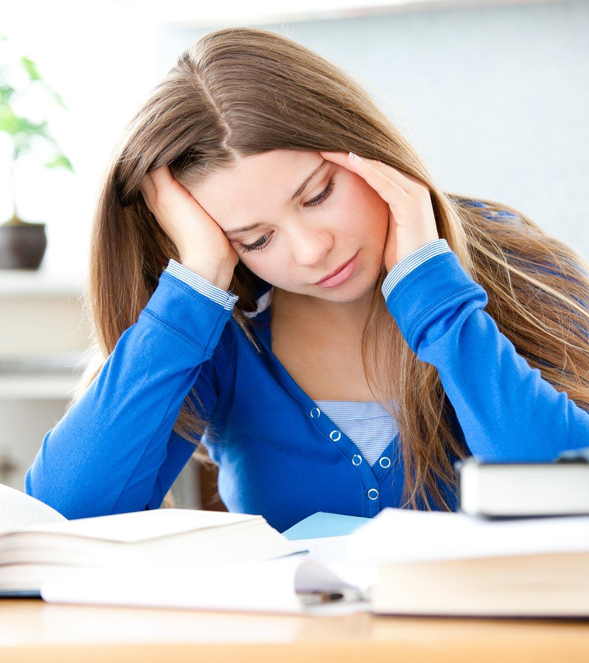 A teenage girl reading books