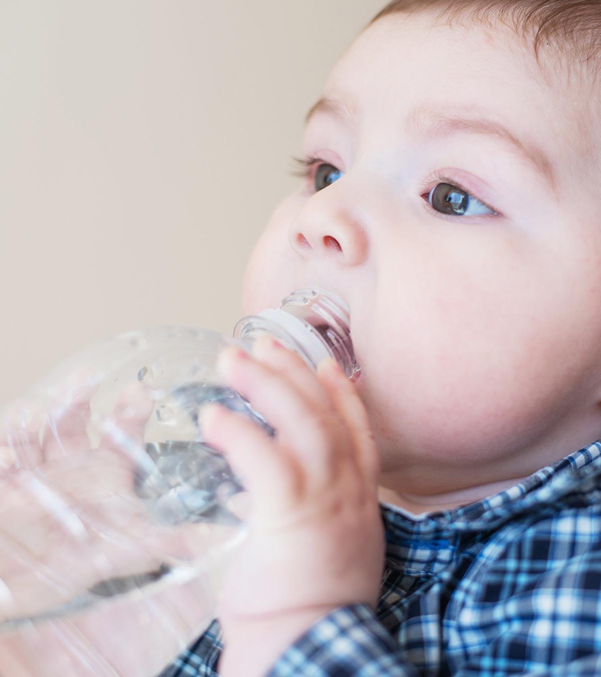 A Baby Having Bottled Water