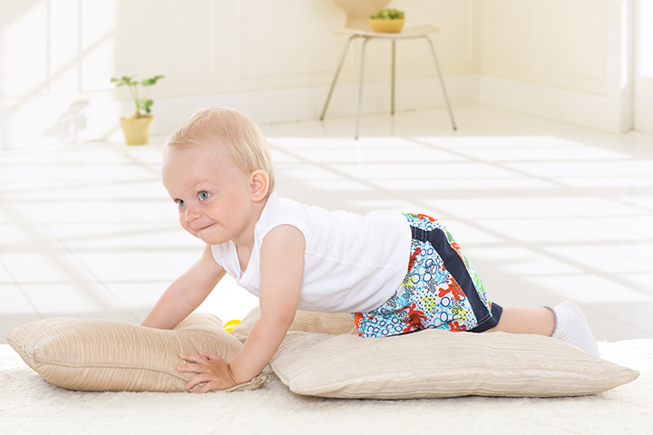 Climbing the pillow mountain learning activity For 13 month old baby