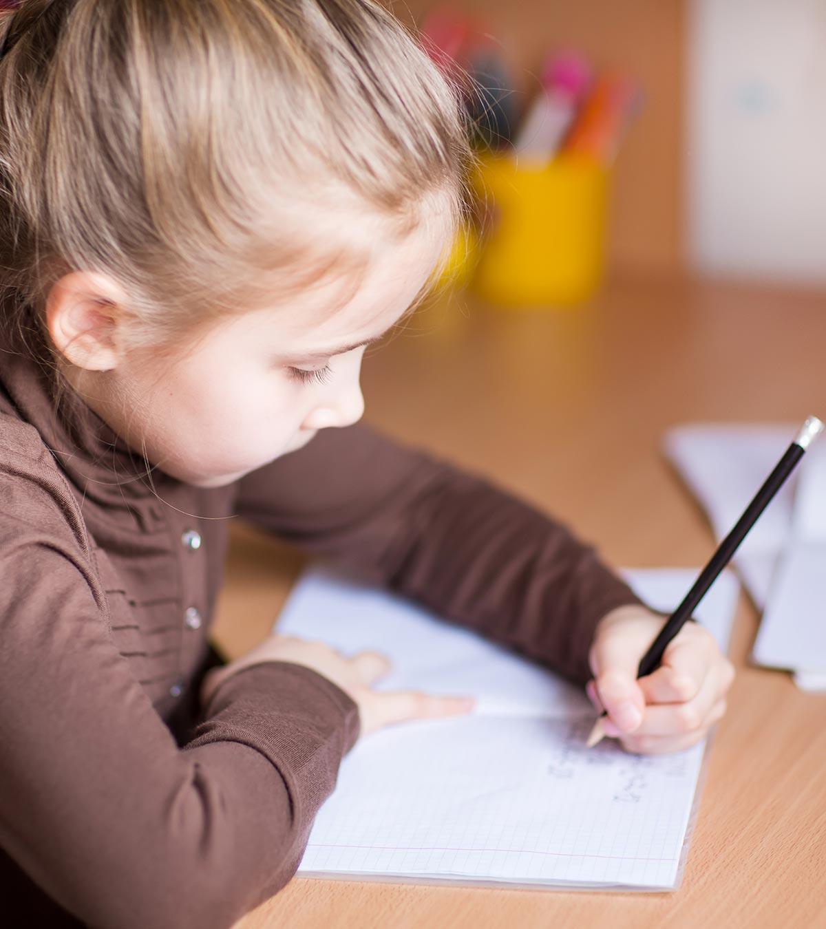 Parent guiding a left-handed child in writing