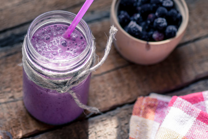 Prune juice smoothie with coconut milk and berries for constipation in toddlers