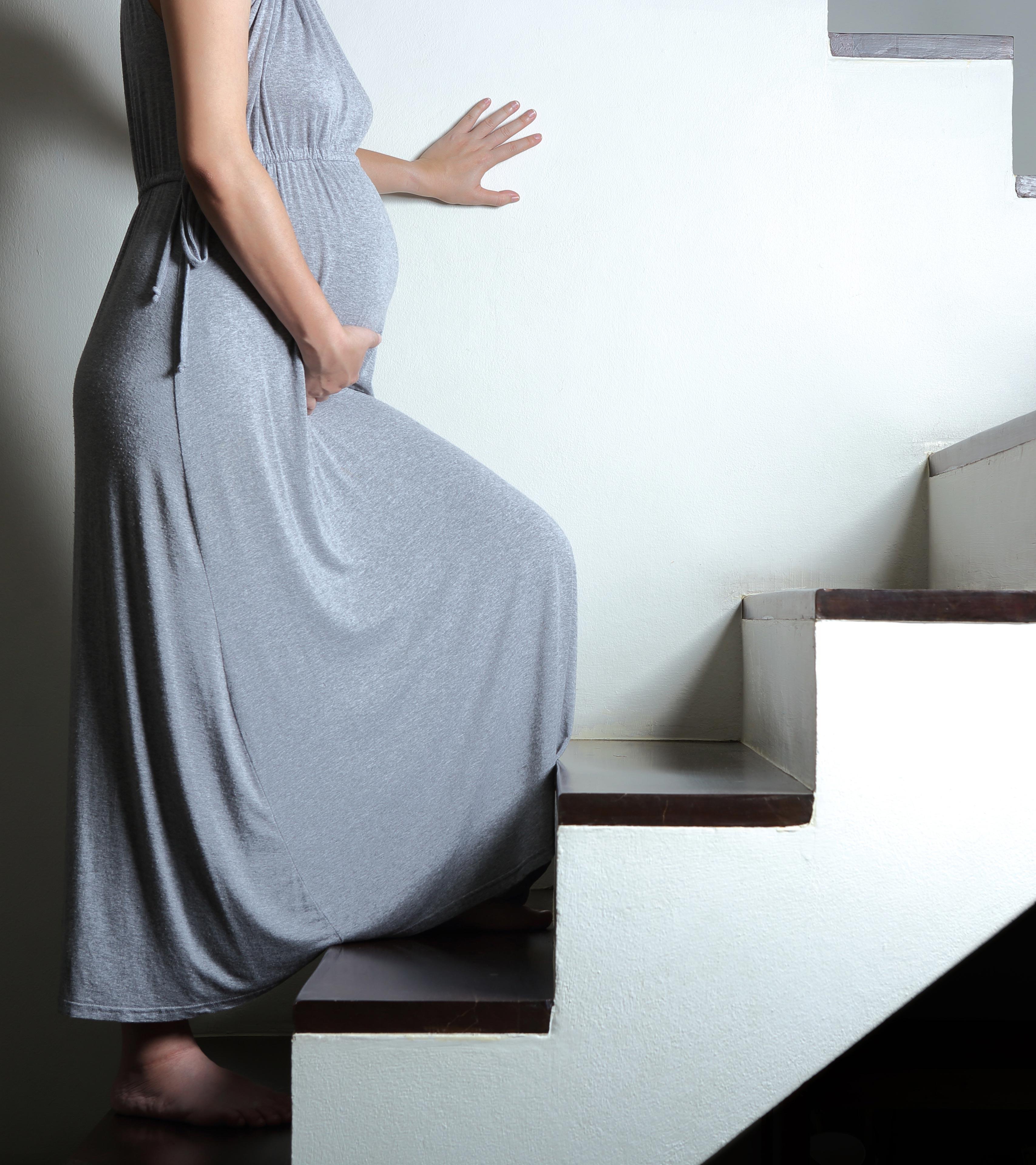 Pregnant Women Climbing Stairs
