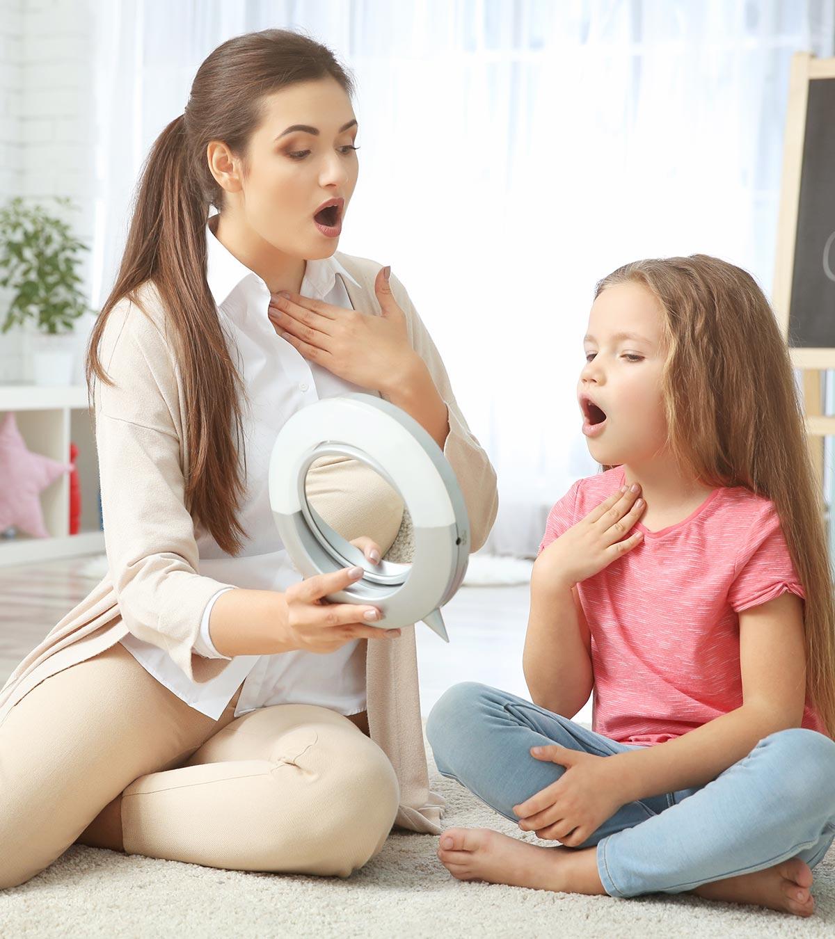 A Mom Teaching Speech Therapy To Her Kid
