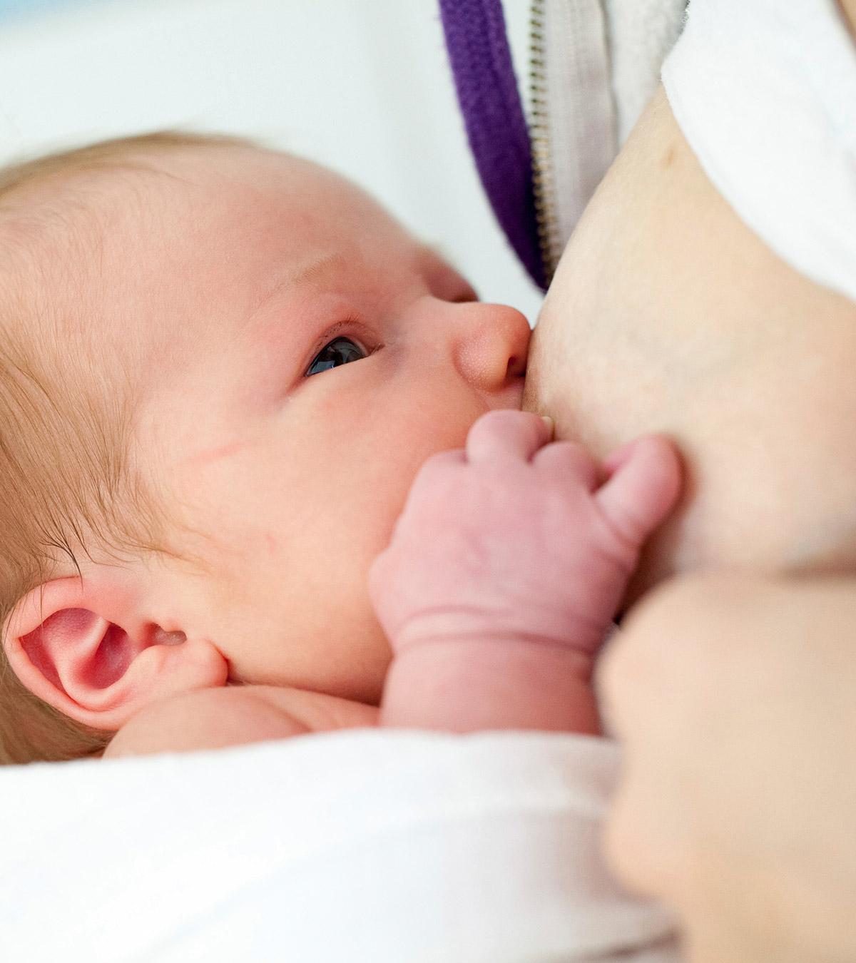 Mother caring for a one-month-old baby