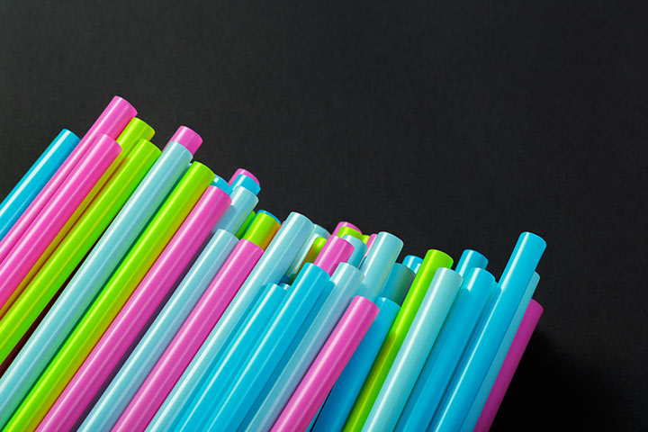 Fun game with drinking straws and pom-poms for 4-year-olds