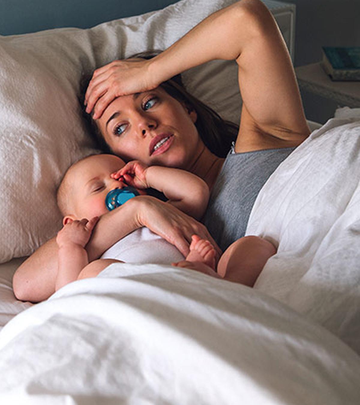 A Breastfeeding Mom Sleeping With Baby