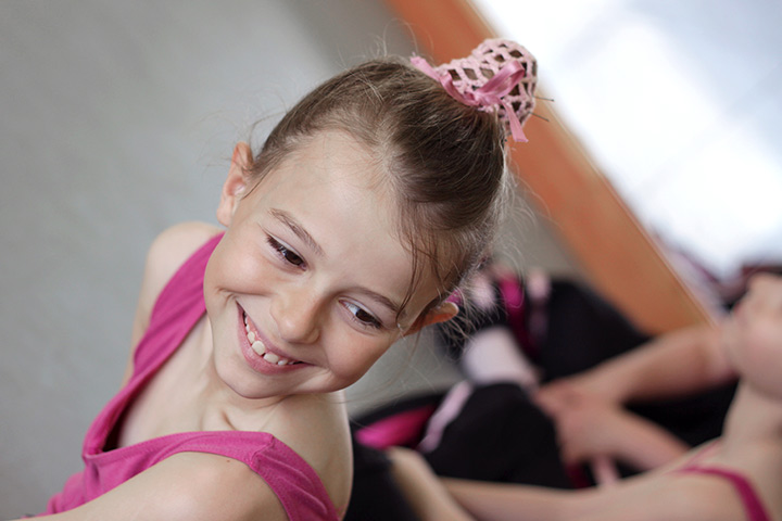 Topknot ballerina bun hairstyle for kids