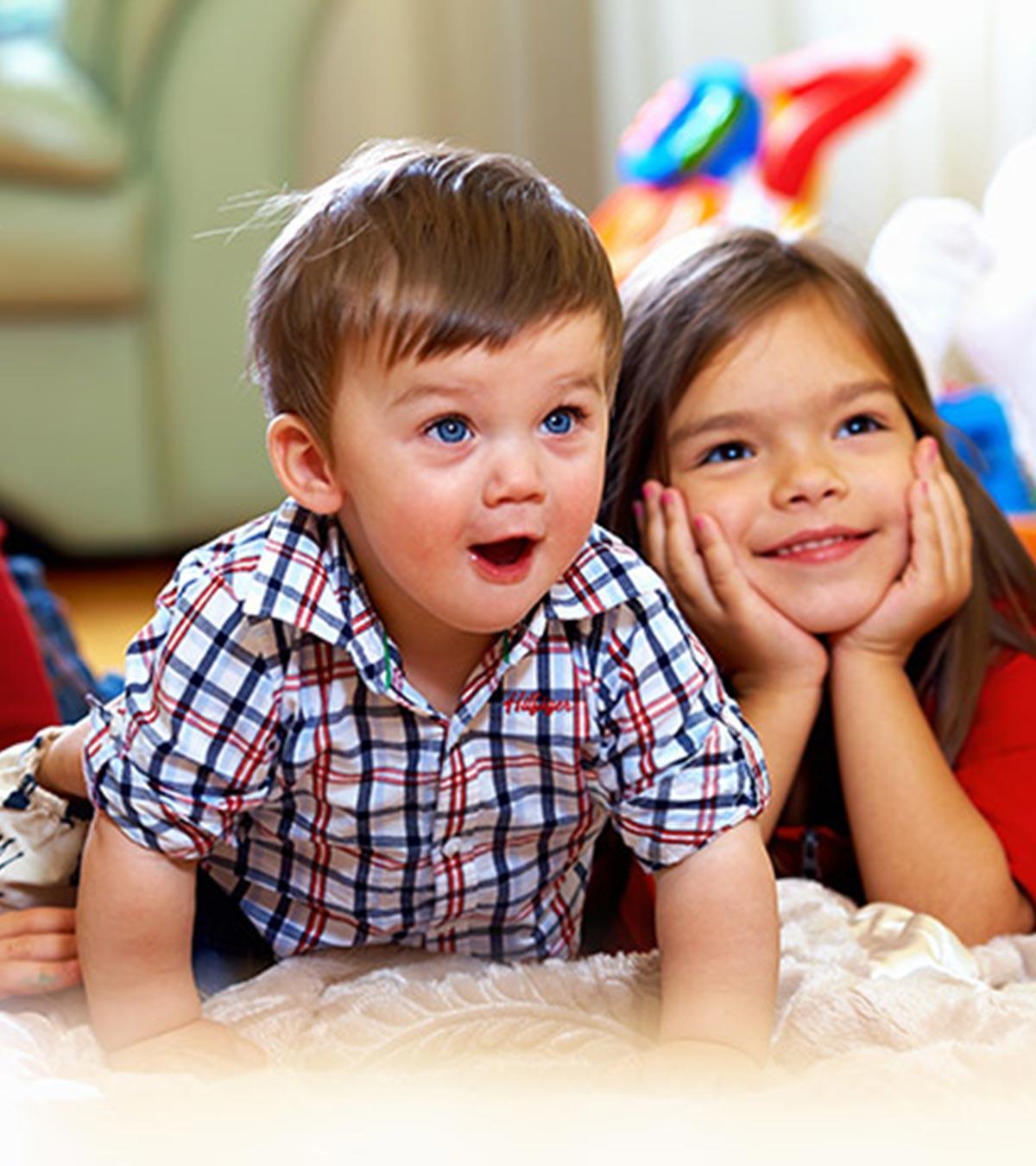 Two kids are watching something