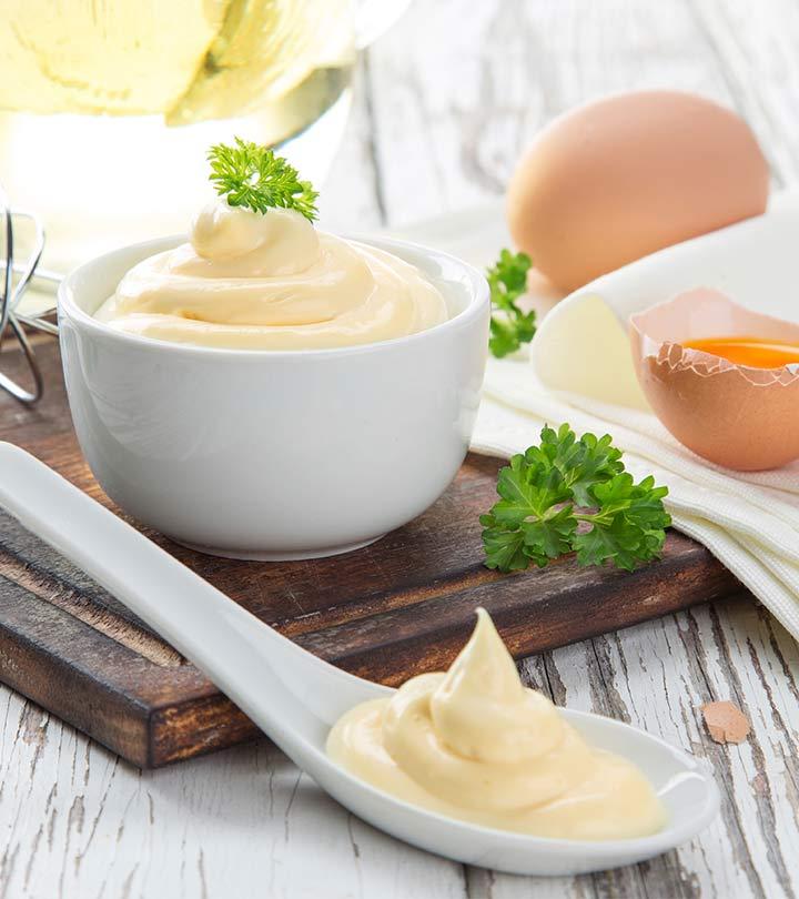 Mayonnaise in a bowl and in a spoon