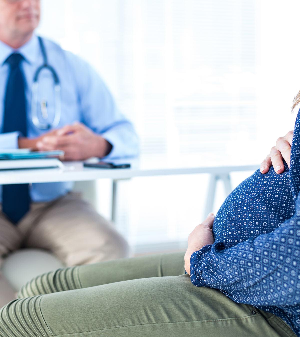 A pregnant lady consults with a doctor