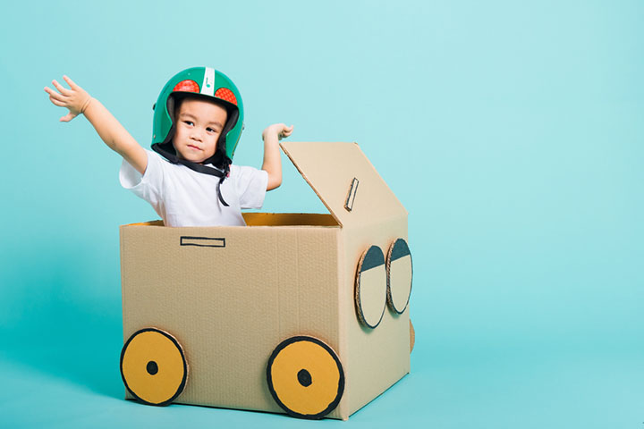 kid driving a play car, cardboard box crafts for kids