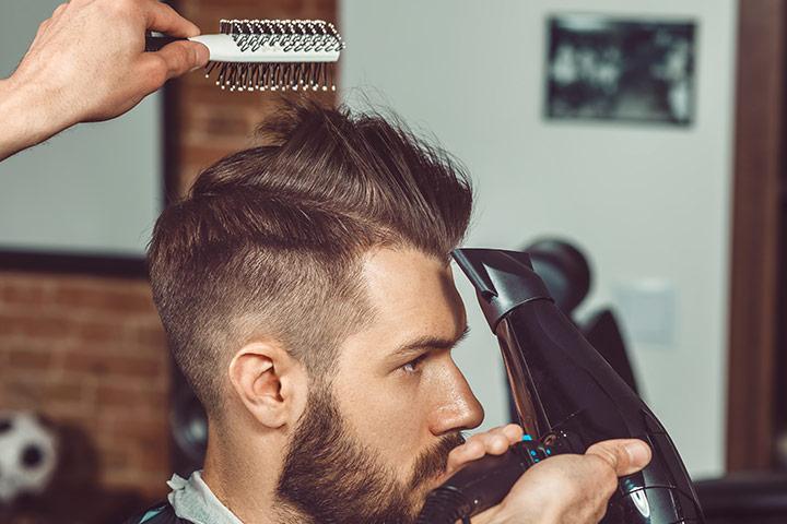 High fade with slick back haircut for teenage guys