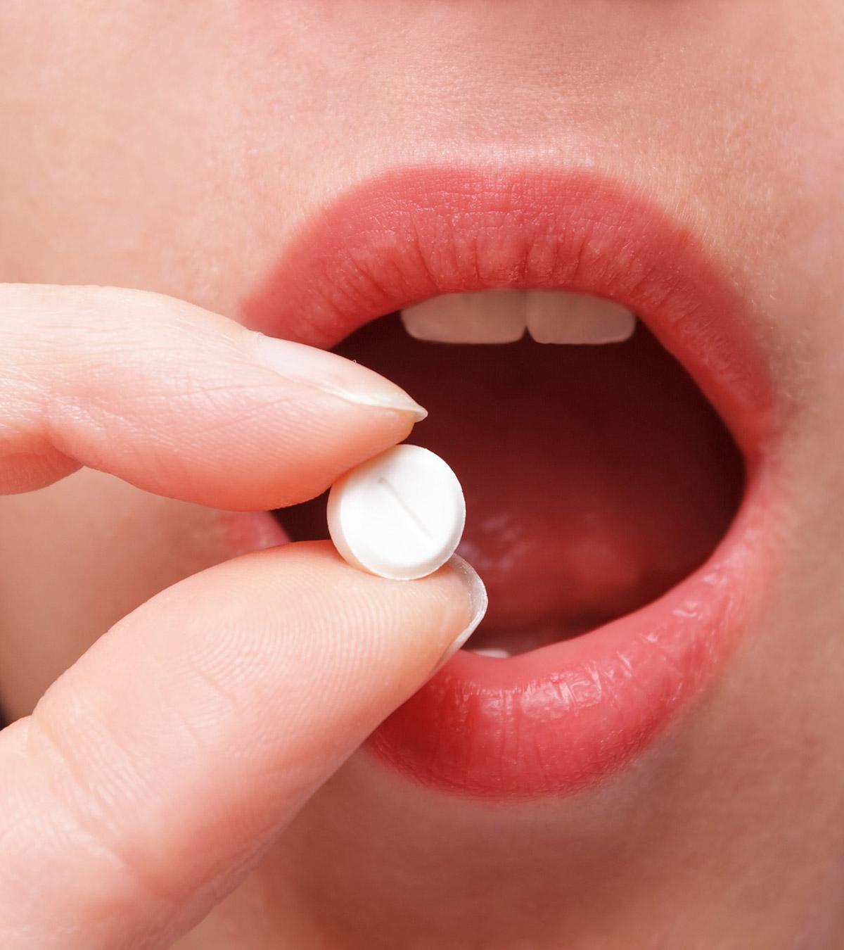 A lady taking tums