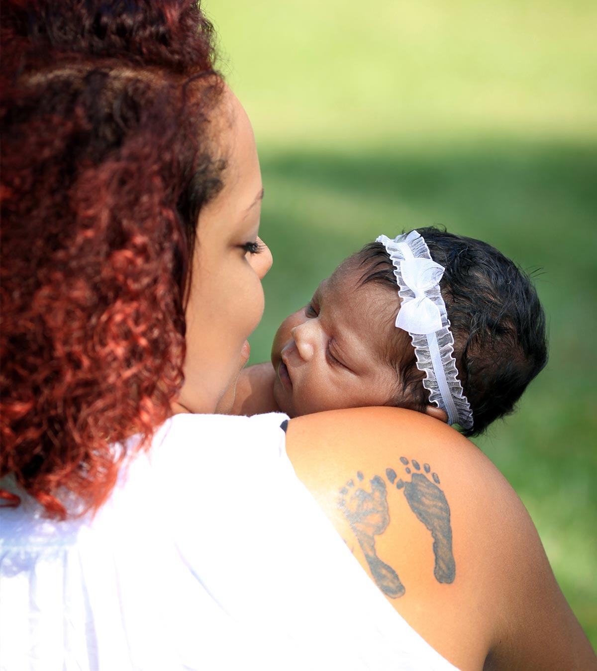 A Mom Having Tattoo On Shoulder