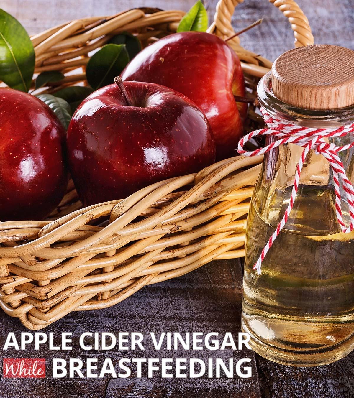 Apple cider vinegar in a glass bottle and some apples in a basket