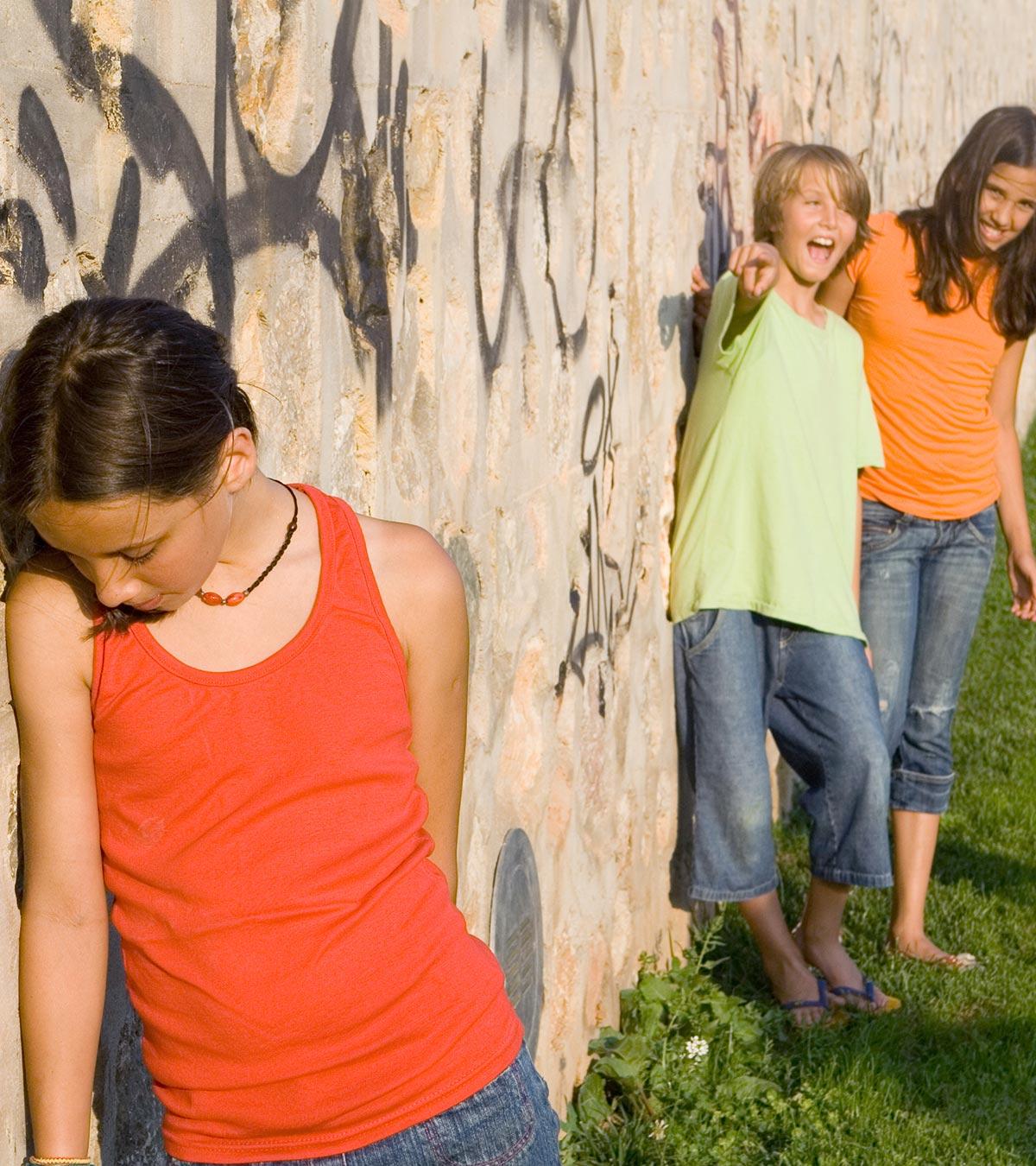 A kid sad about her mean girls at school