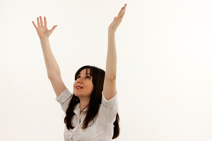 The Hand Raising pose yoga asana during pregnancy