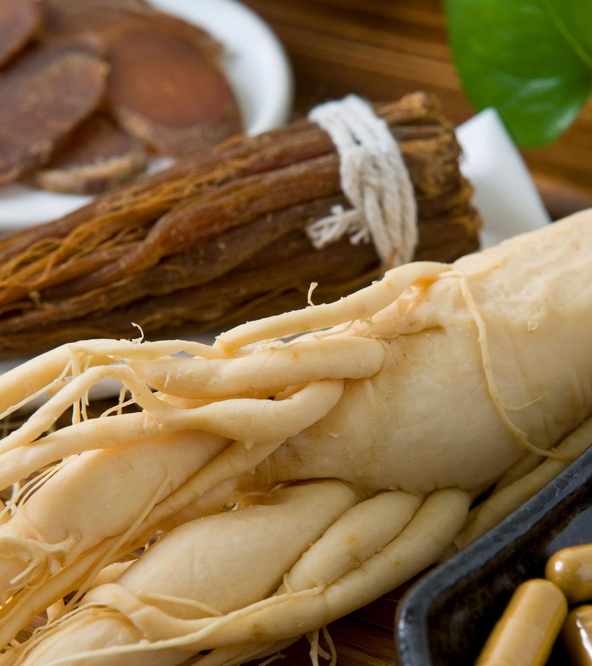 Woman Breastfeeding With Ginseng Supplement