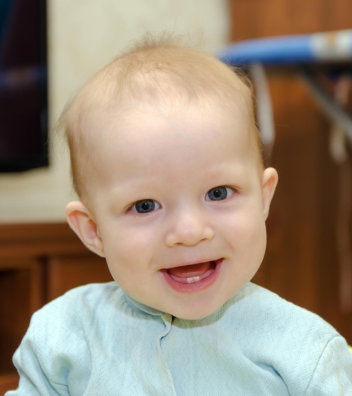 Baby with two newly grown teeth