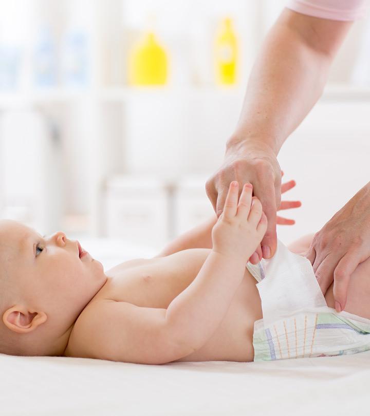 Father changing his baby