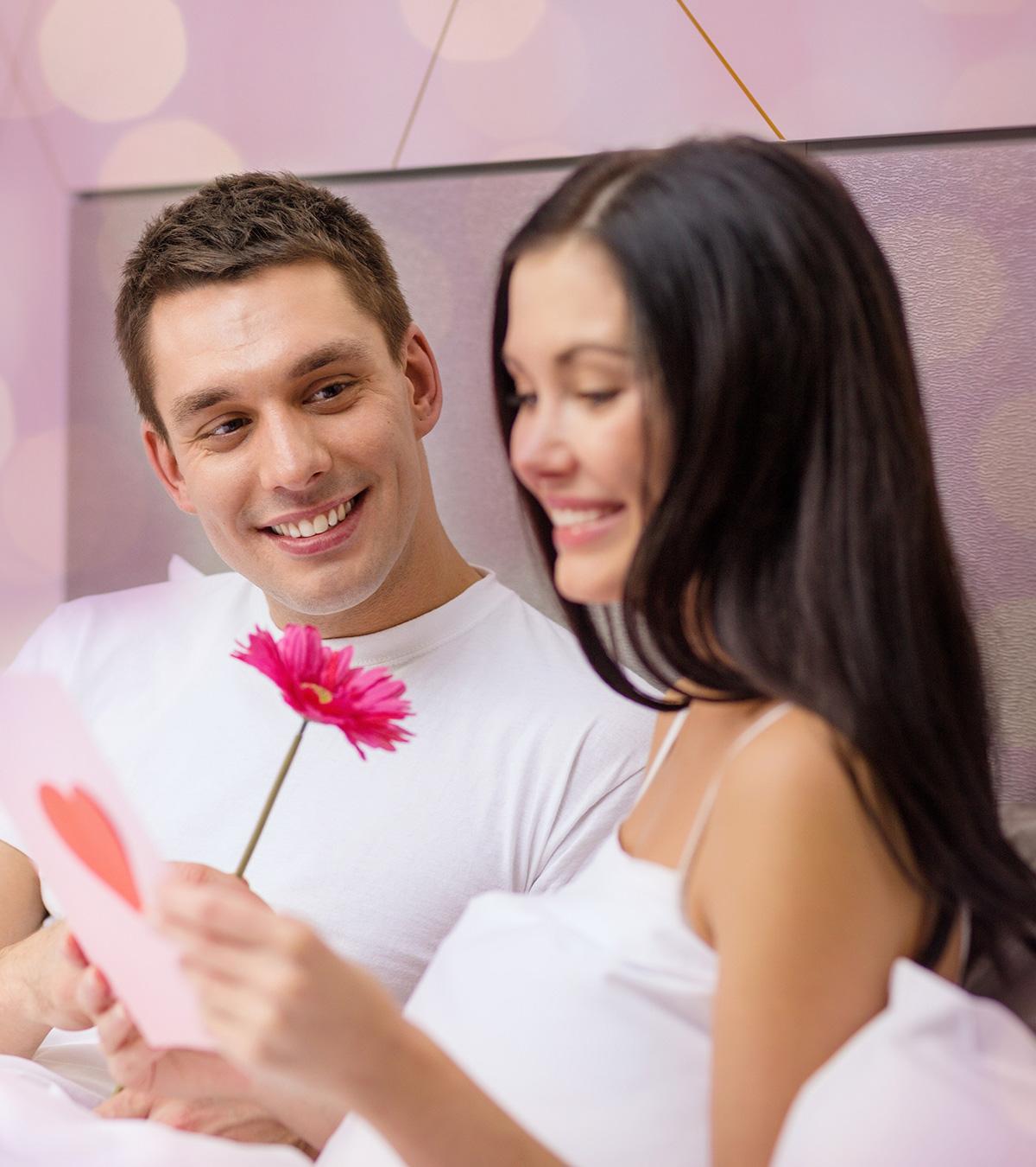 Husband Giving A Love Poems Card To Wife