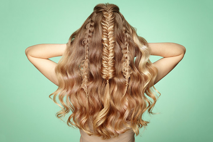 Three-braided curly hairstyle for girls