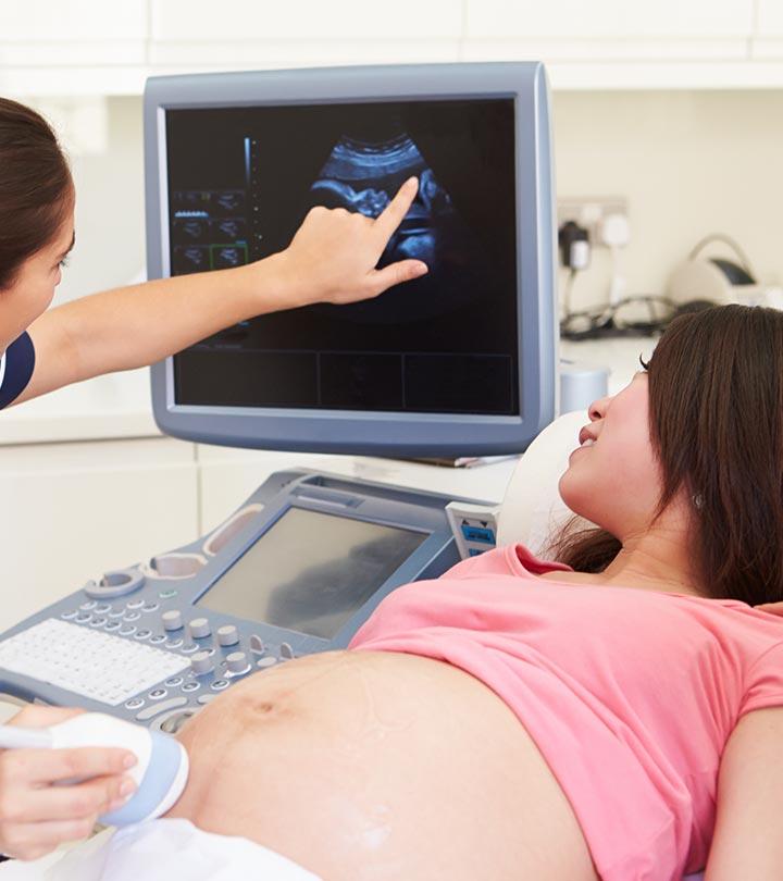 A doctor doing nuchal translucency scanning