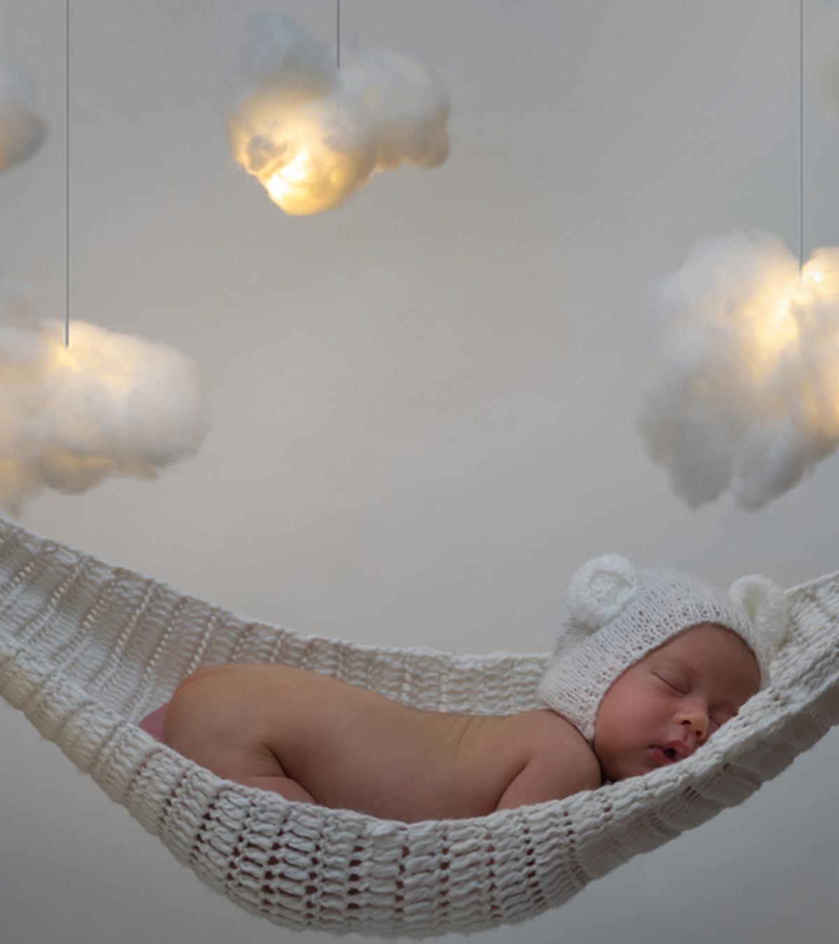 Baby Sleeping In Swing