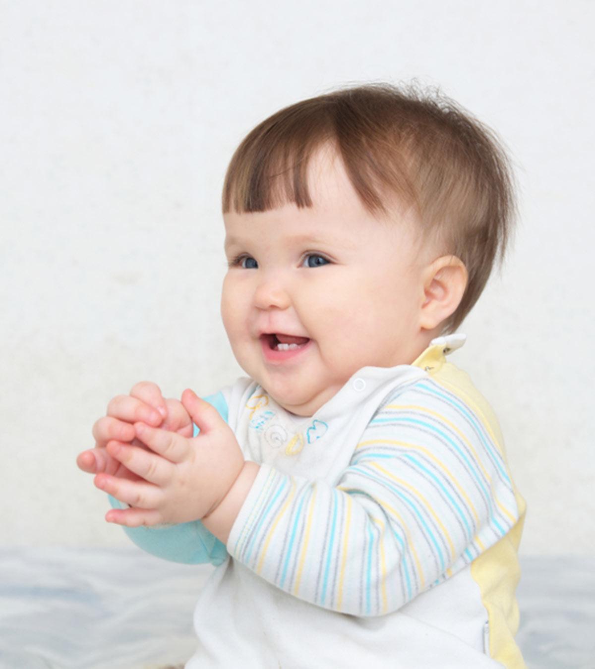 A baby is clapping