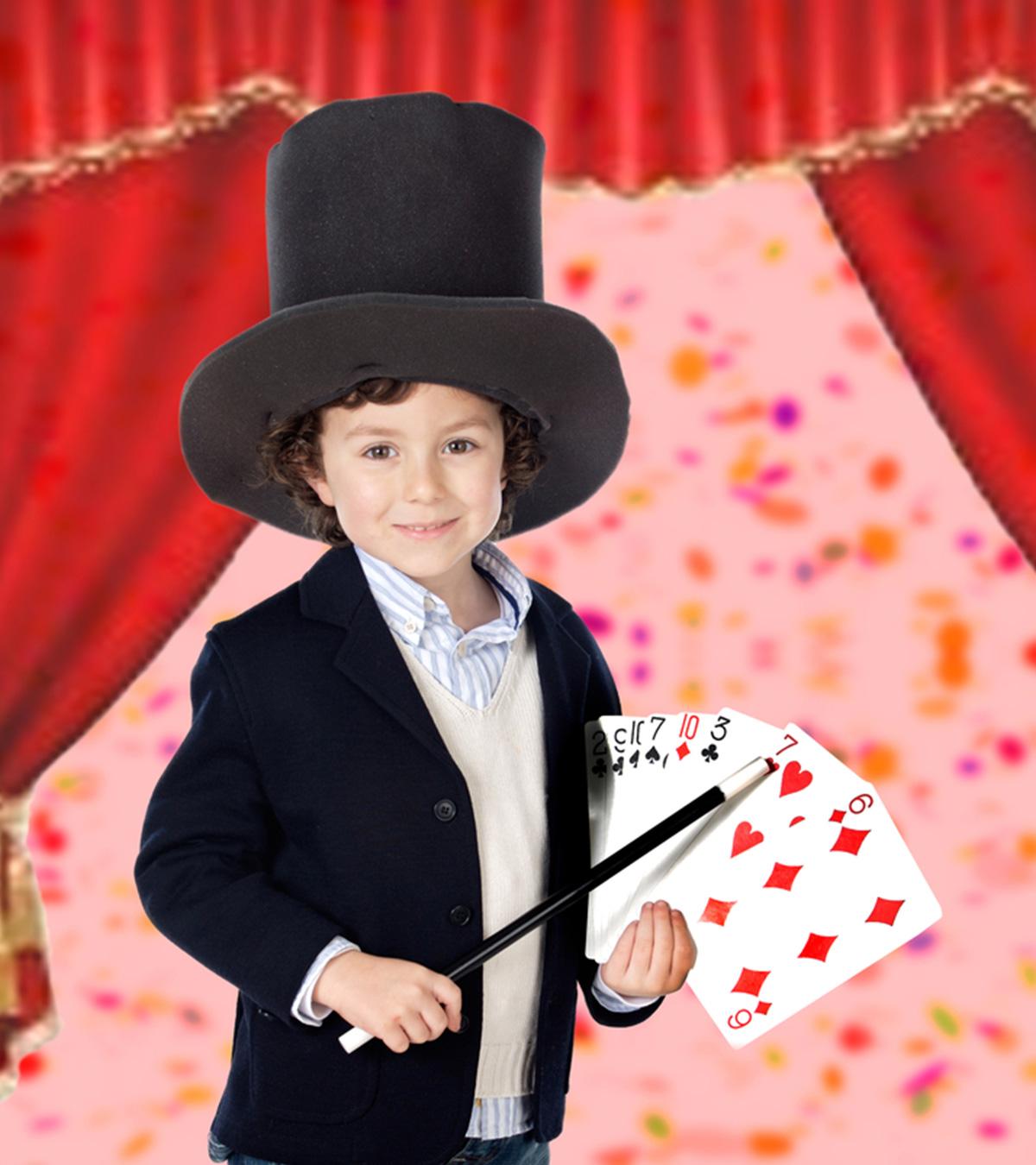 Kid Doing Magic Tricks With Cards