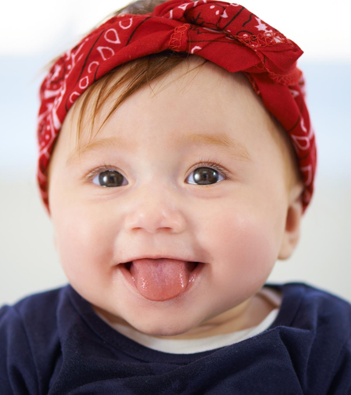 A Baby Chewing Her Tongue