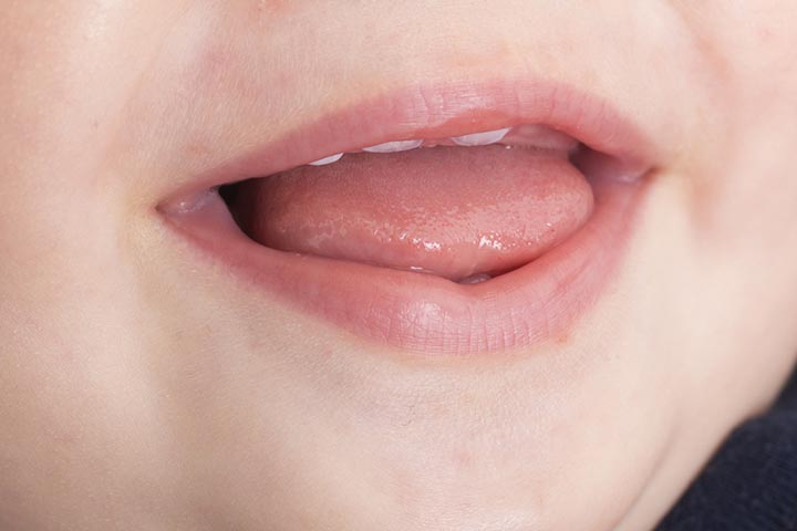 Baby chews tongue due to teething