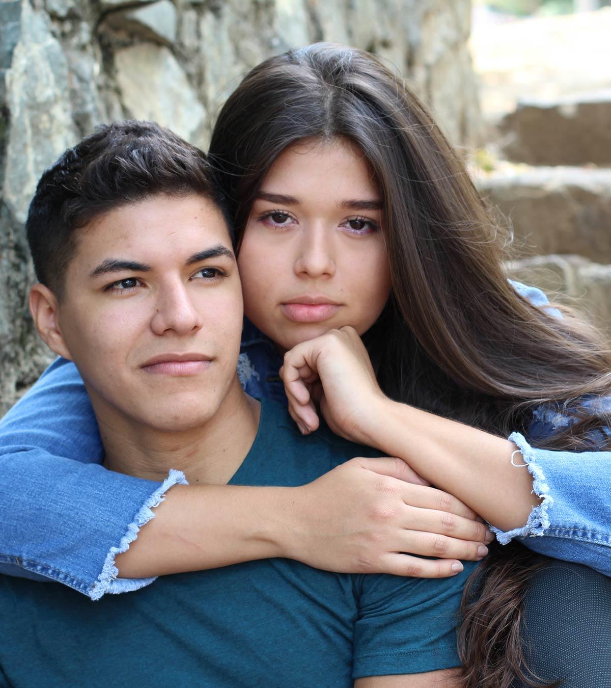 A Clingy Girlfriend Holding Her Man